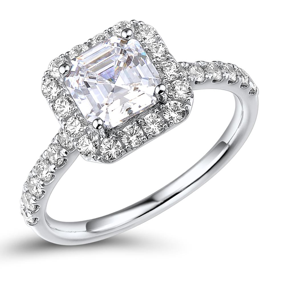 Emerald Cut and Round Brilliant halo engagement ring with 2.21 carats* of diamond simulants in 14 ca