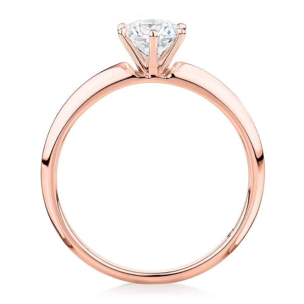 Round Brilliant solitaire engagement ring with 0.70 carat* diamond simulant in 14 carat rose gold