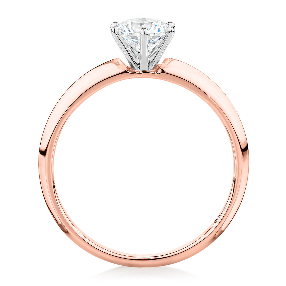 Round Brilliant solitaire engagement ring with 0.70 carat* diamond simulant in 14 carat rose and white gold