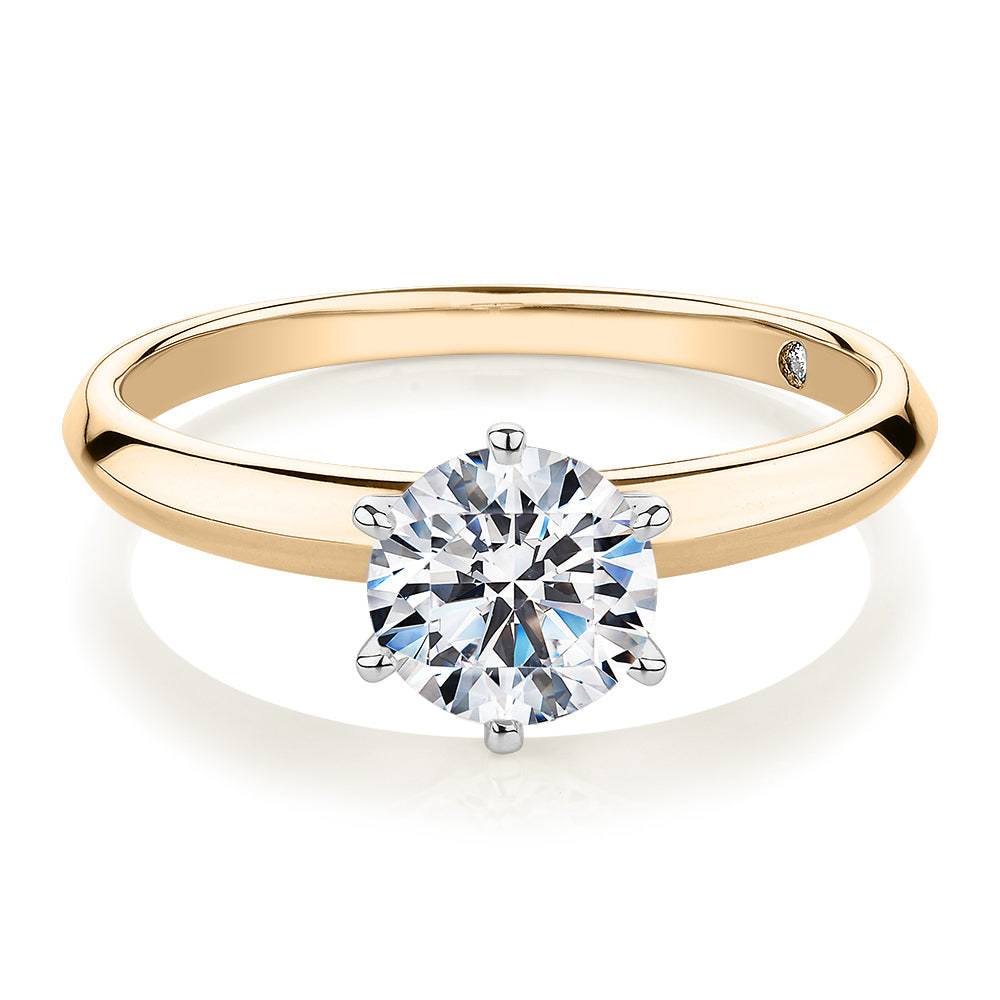 Round Brilliant solitaire engagement ring with 1 carat* diamond simulant in 10 carat yellow and white gold
