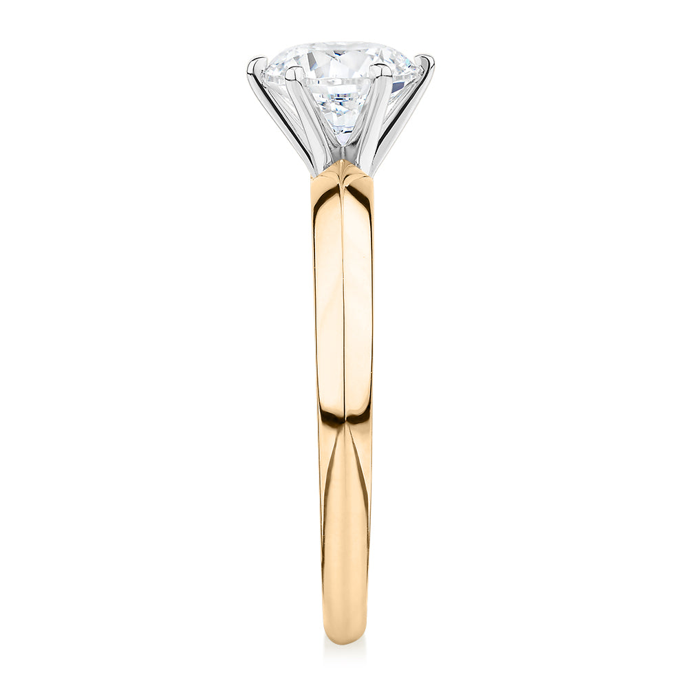 Round Brilliant solitaire engagement ring with 1 carat* diamond simulant in 10 carat yellow and white gold