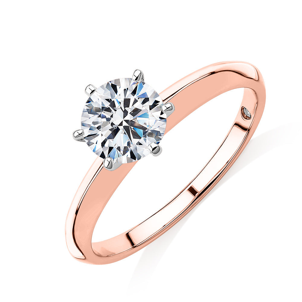 Round Brilliant solitaire engagement ring with 1 carat* diamond simulant in 10 carat rose and white gold