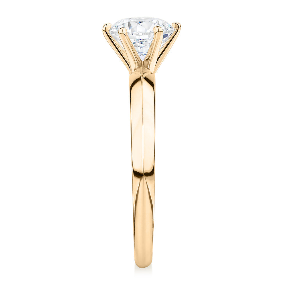 Round Brilliant solitaire engagement ring with 1 carat* diamond simulant in 10 carat yellow gold