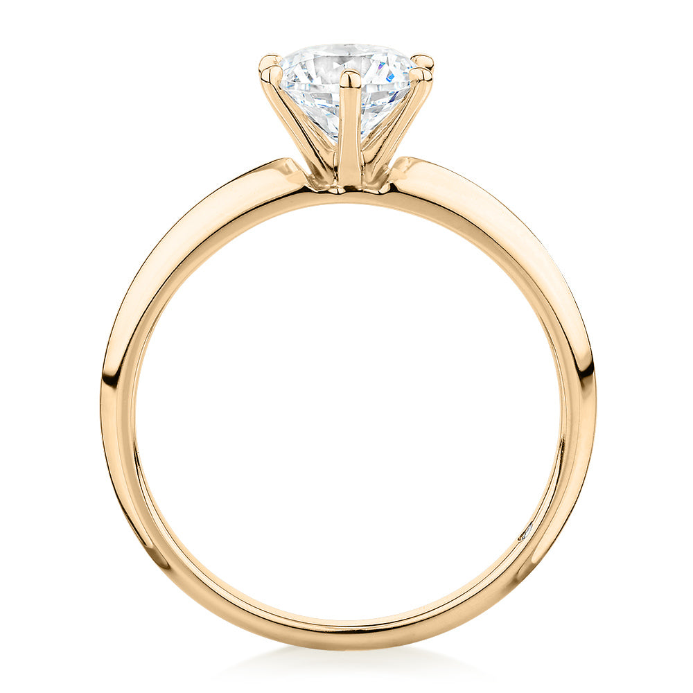 Round Brilliant solitaire engagement ring with 1 carat* diamond simulant in 10 carat yellow gold