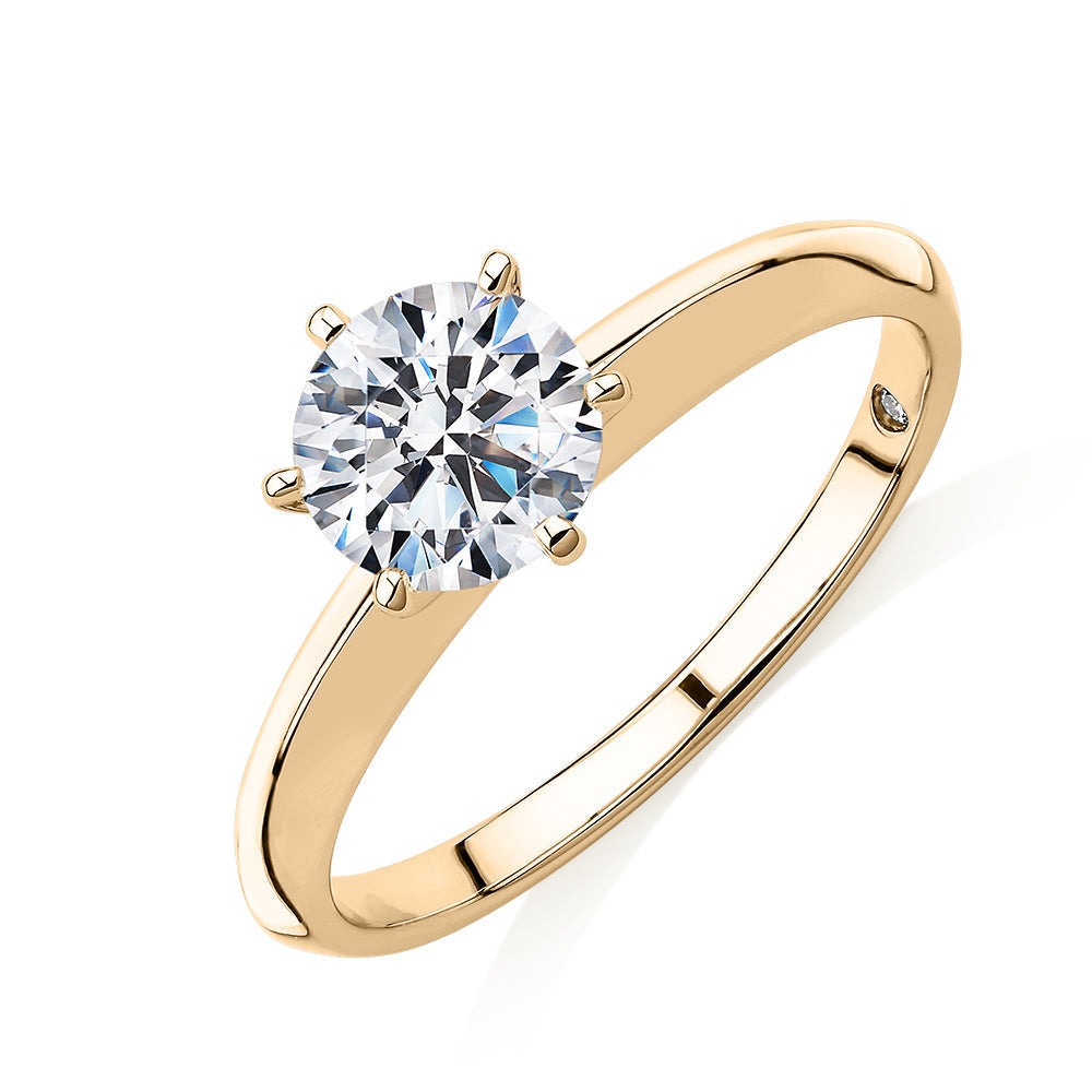 Round Brilliant solitaire engagement ring with 1 carat* diamond simulant in 10 carat yellow gold