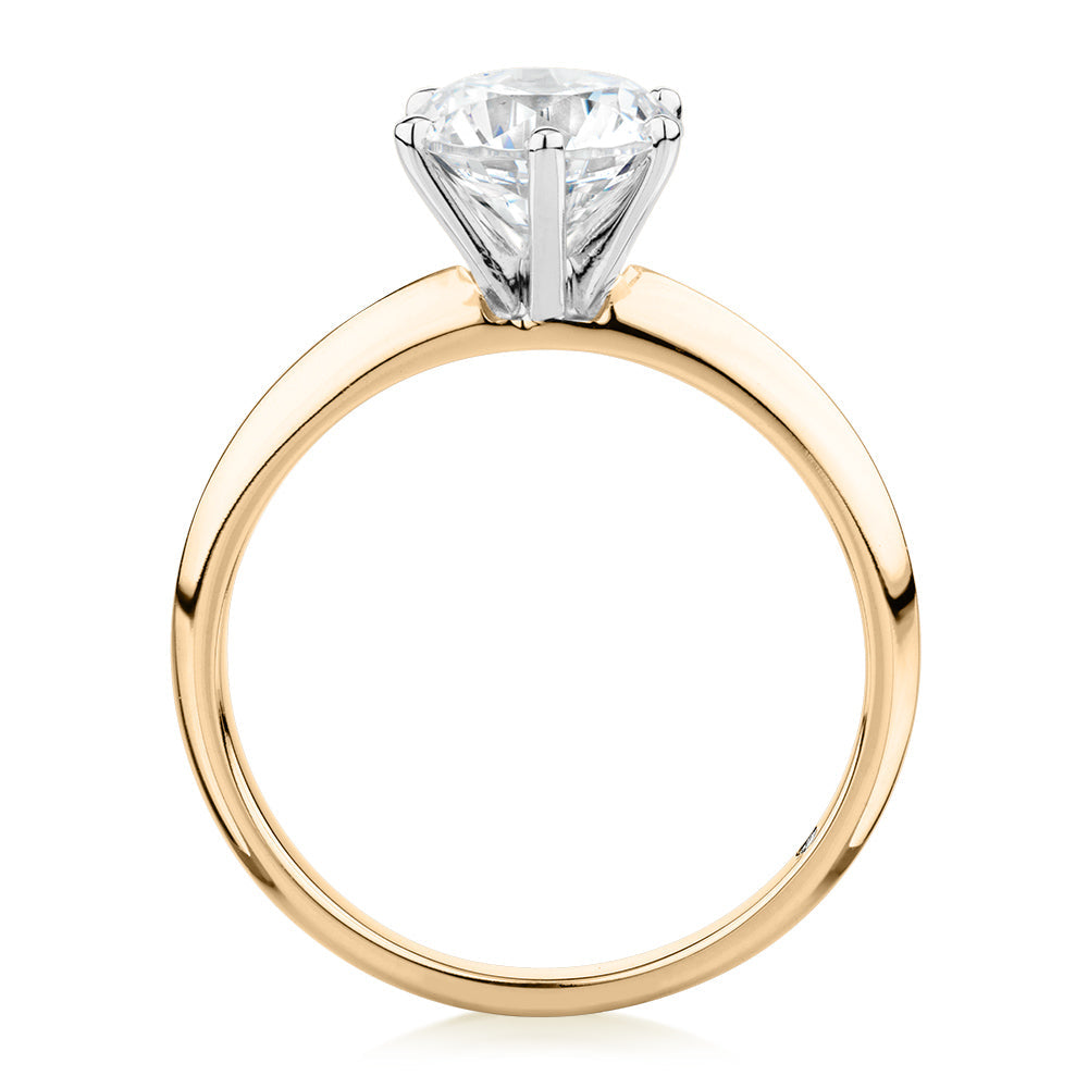 Round Brilliant solitaire engagement ring with 1.5 carat* diamond simulant in 14 carat yellow and white gold