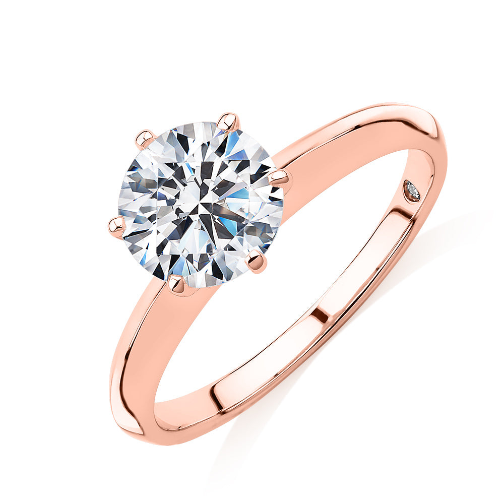 Round Brilliant solitaire engagement ring with 1.5 carat* diamond simulant in 14 carat rose gold