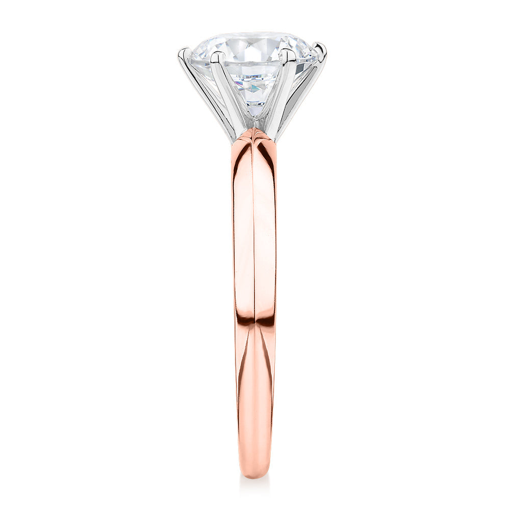Round Brilliant solitaire engagement ring with 1.5 carat* diamond simulant in 14 carat rose and white gold