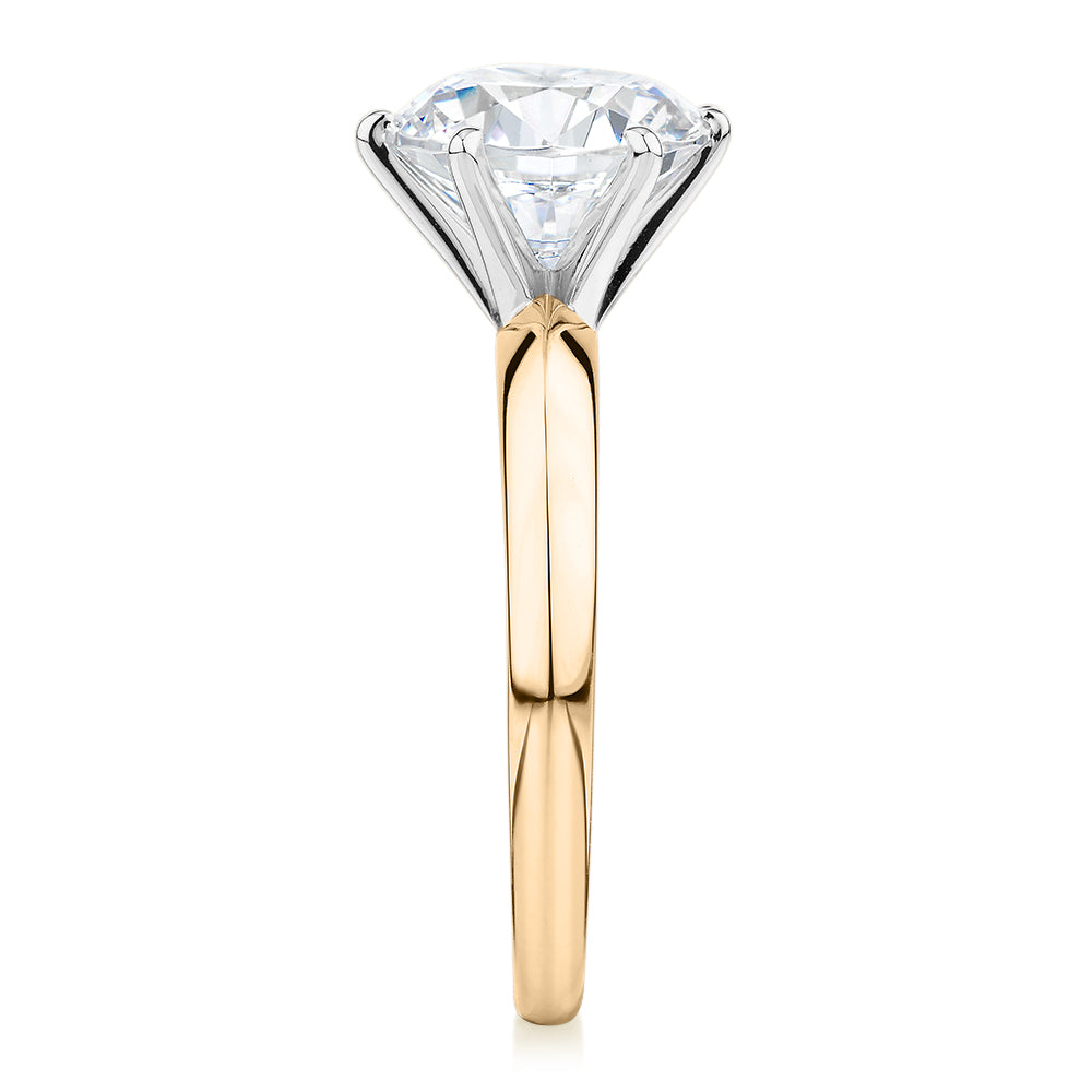 Round Brilliant solitaire engagement ring with 3 carat* diamond simulant in 14 carat yellow and white gold