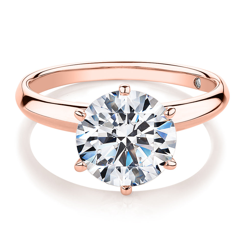 Round Brilliant solitaire engagement ring with 3 carat* diamond simulant in 14 carat rose gold