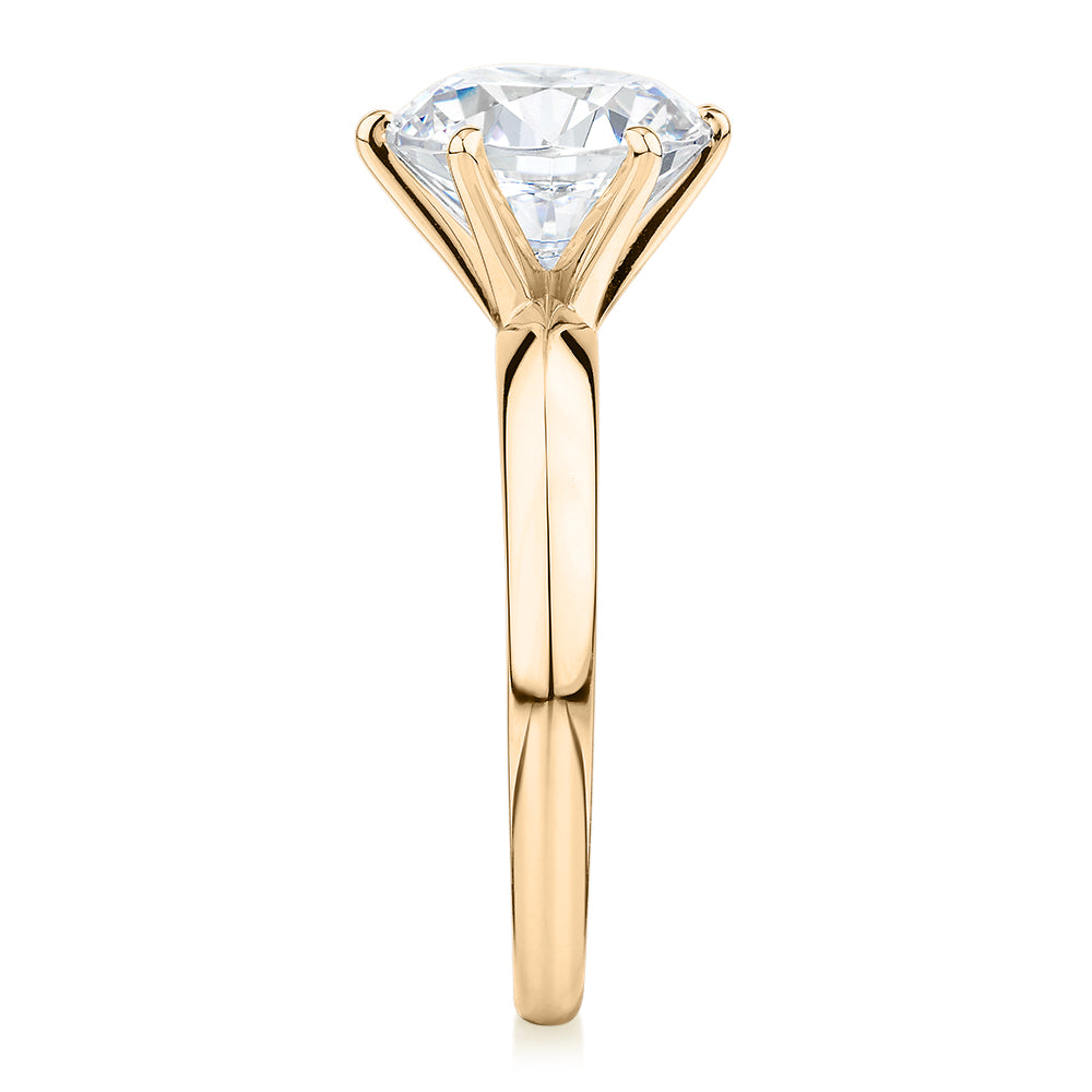 Round Brilliant solitaire engagement ring with 3 carat* diamond simulant in 14 carat yellow gold