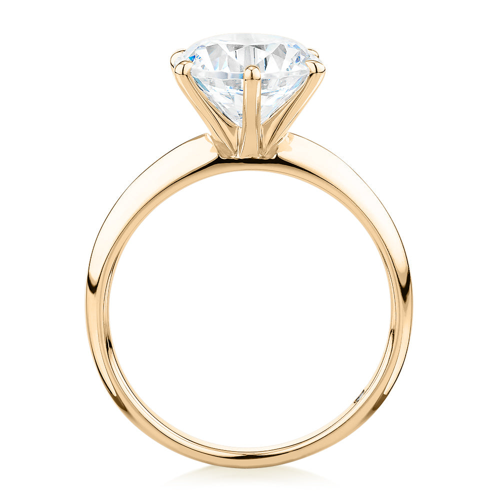 Round Brilliant solitaire engagement ring with 3 carat* diamond simulant in 14 carat yellow gold