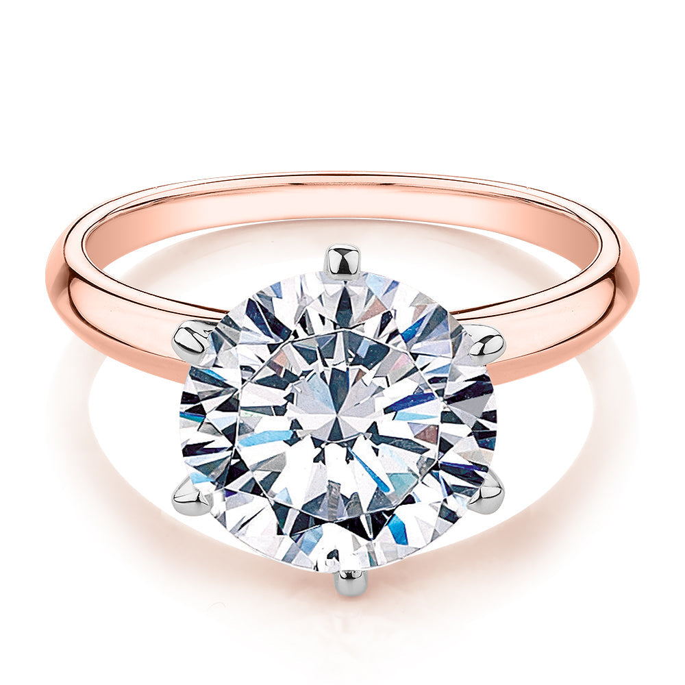 Round Brilliant solitaire engagement ring with 4 carat* diamond simulant in 10 carat rose and white gold