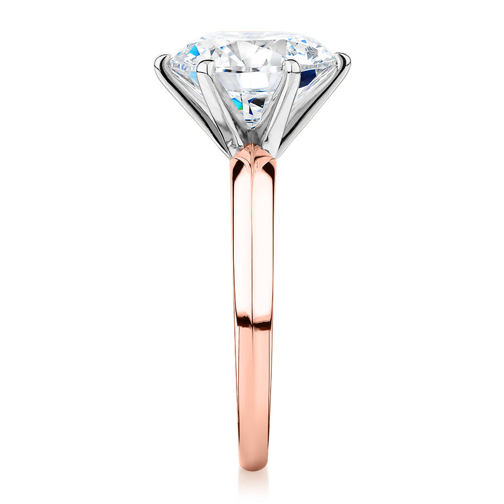 Round Brilliant solitaire engagement ring with 4 carat* diamond simulant in 10 carat rose and white gold