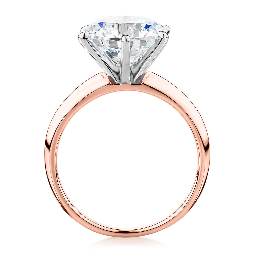 Round Brilliant solitaire engagement ring with 4 carat* diamond simulant in 10 carat rose and white gold