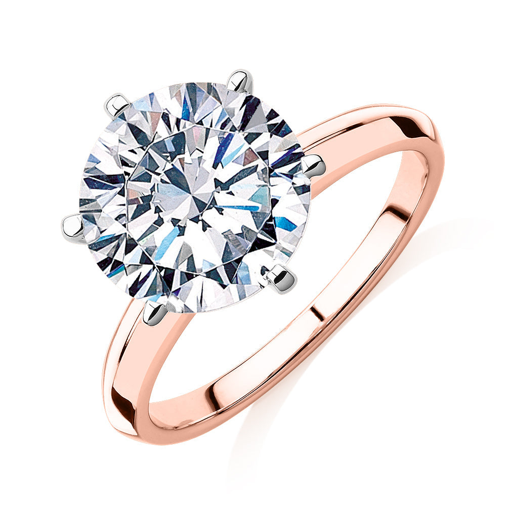 Round Brilliant solitaire engagement ring with 4 carat* diamond simulant in 10 carat rose and white gold