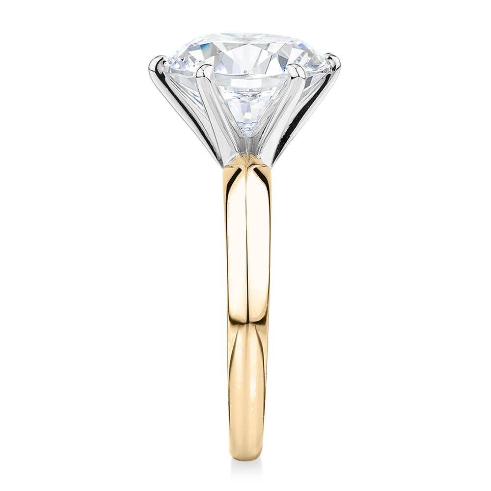Round Brilliant solitaire engagement ring with 5.49 carat* diamond simulant in 14 carat yellow and white gold