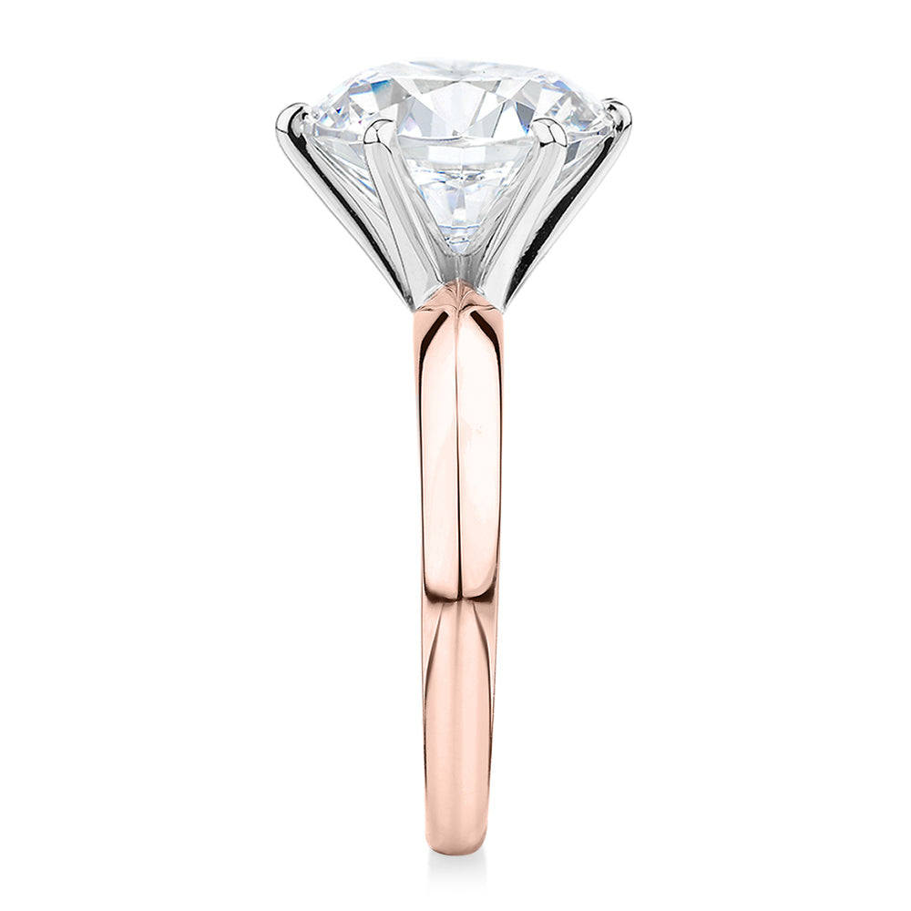 Round Brilliant solitaire engagement ring with 5.49 carat* diamond simulant in 14 carat rose and white gold