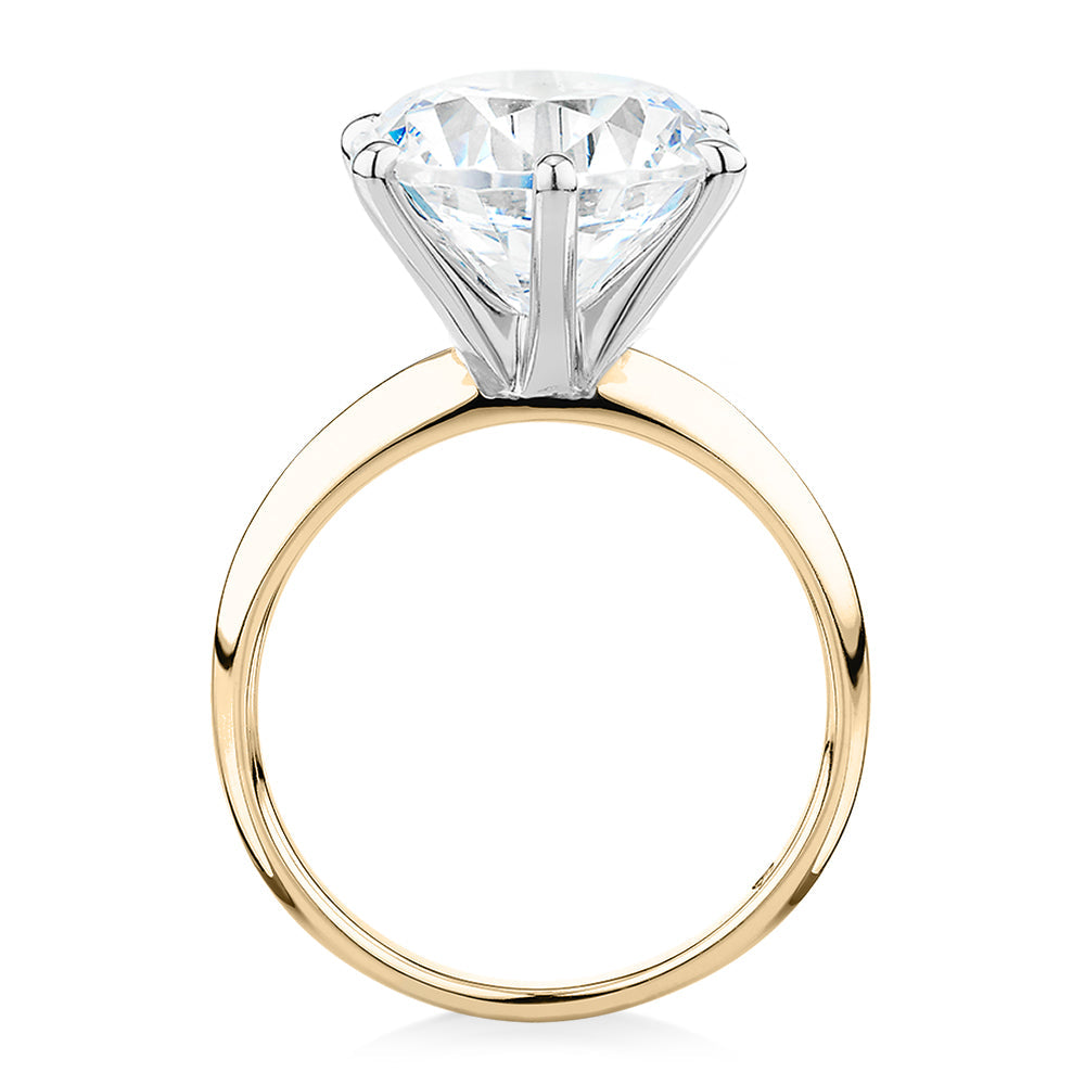 Round Brilliant solitaire engagement ring with 7 carat* diamond simulant in 14 carat yellow and white gold