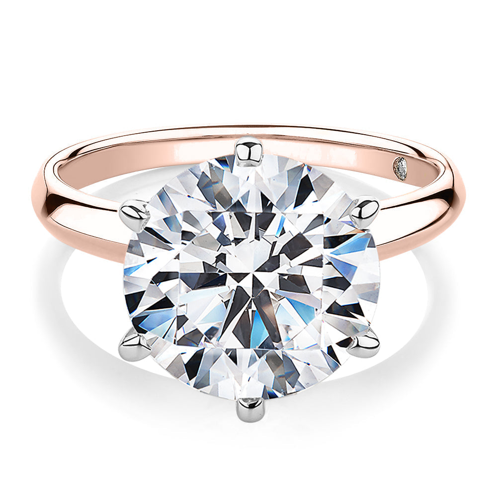 Round Brilliant solitaire engagement ring with 7 carat* diamond simulant in 14 carat rose and white gold