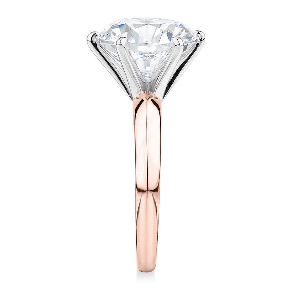 Round Brilliant solitaire engagement ring with 7 carat* diamond simulant in 14 carat rose and white gold
