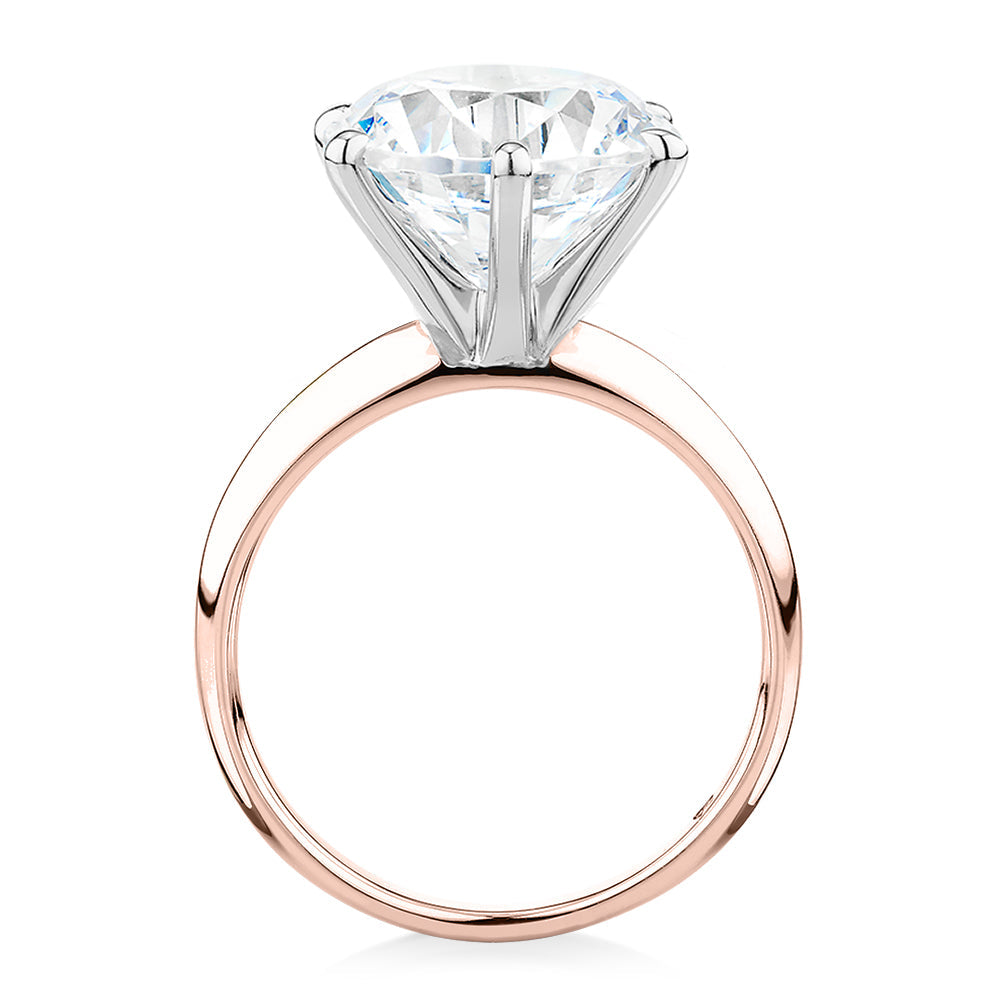 Round Brilliant solitaire engagement ring with 7 carat* diamond simulant in 14 carat rose and white gold