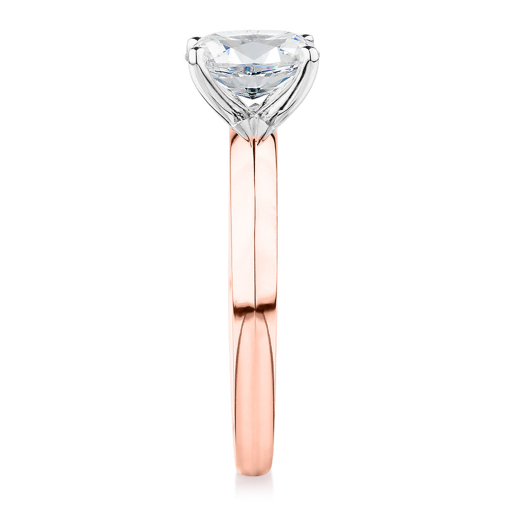 Oval solitaire engagement ring with 1.21 carat* diamond simulant in 14 carat rose and white gold