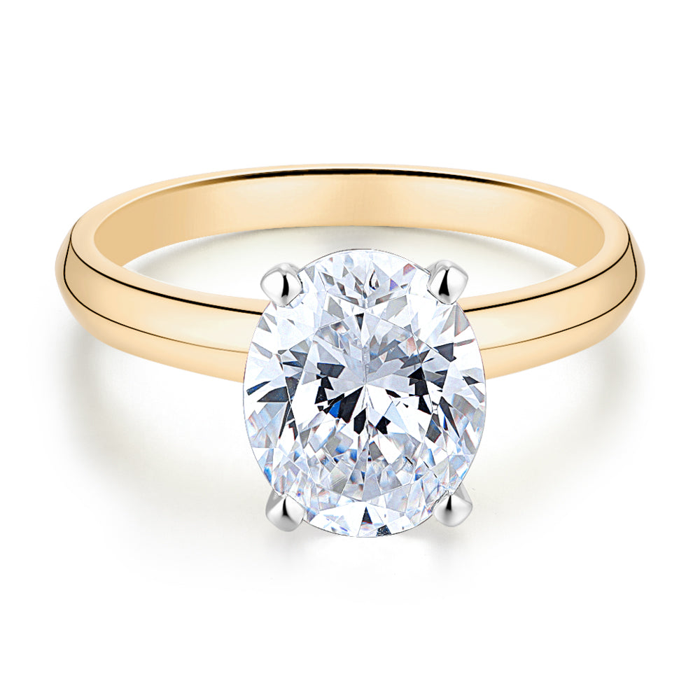 Oval solitaire engagement ring with 2.54 carat* diamond simulant in 10 carat yellow and white gold