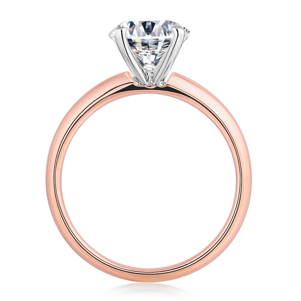Oval solitaire engagement ring with 2.54 carat* diamond simulant in 14 carat rose and white gold