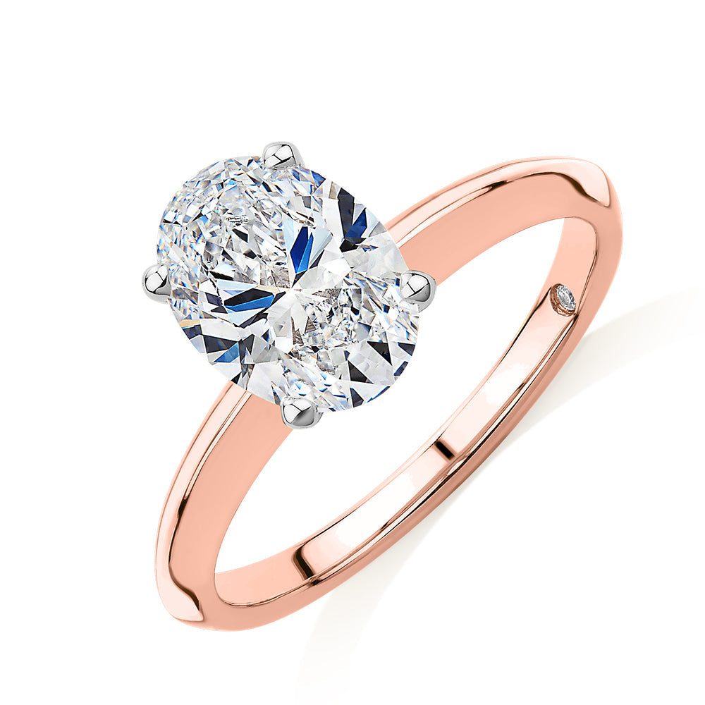 Signature Simulant Diamond 2.00 carat* oval solitaire engagement ring in 10 carat rose and white gold