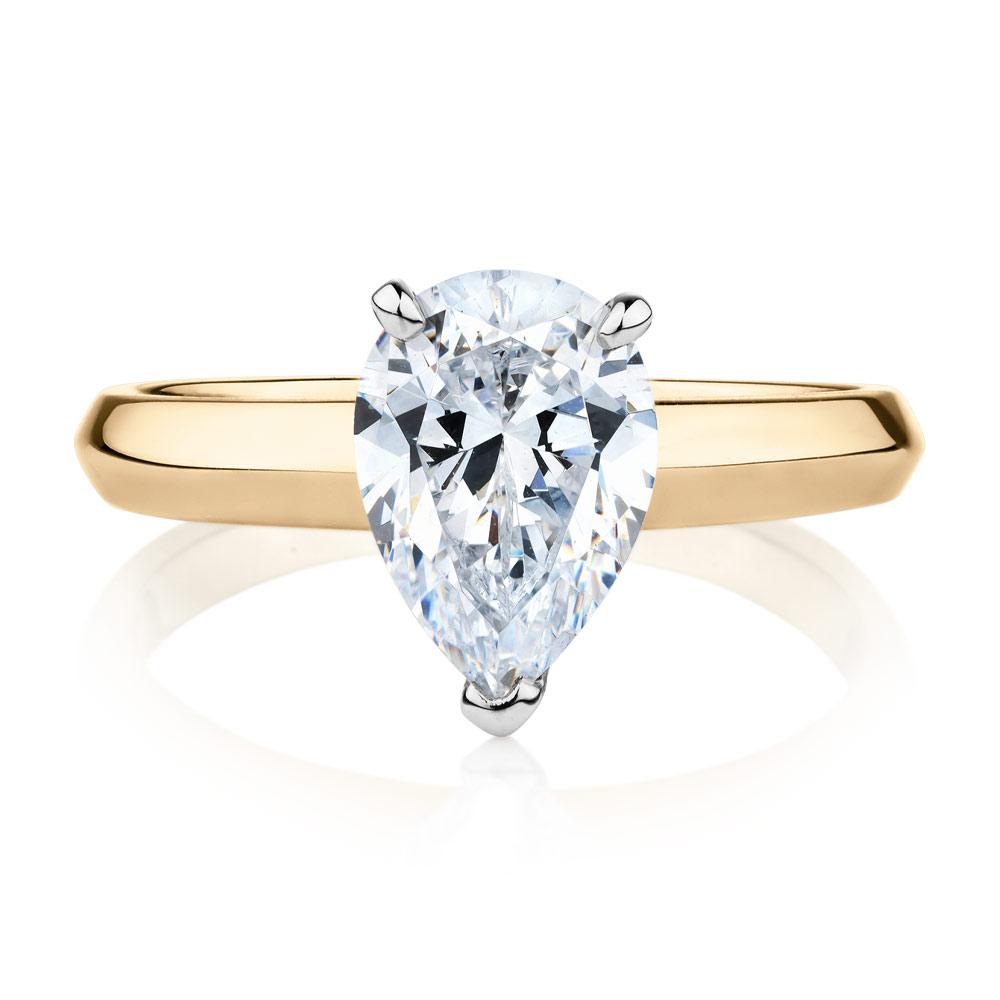 Pear solitaire engagement ring with 1.8 carat* diamond simulant in 10 carat yellow and white gold