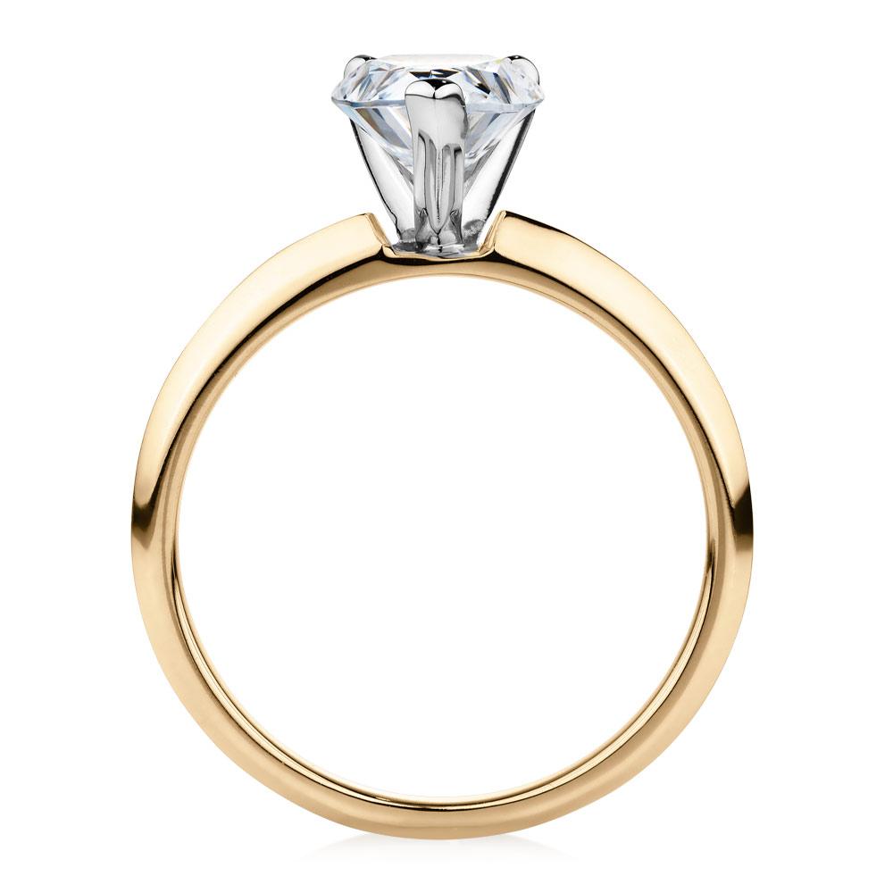 Pear solitaire engagement ring with 1.8 carat* diamond simulant in 10 carat yellow and white gold