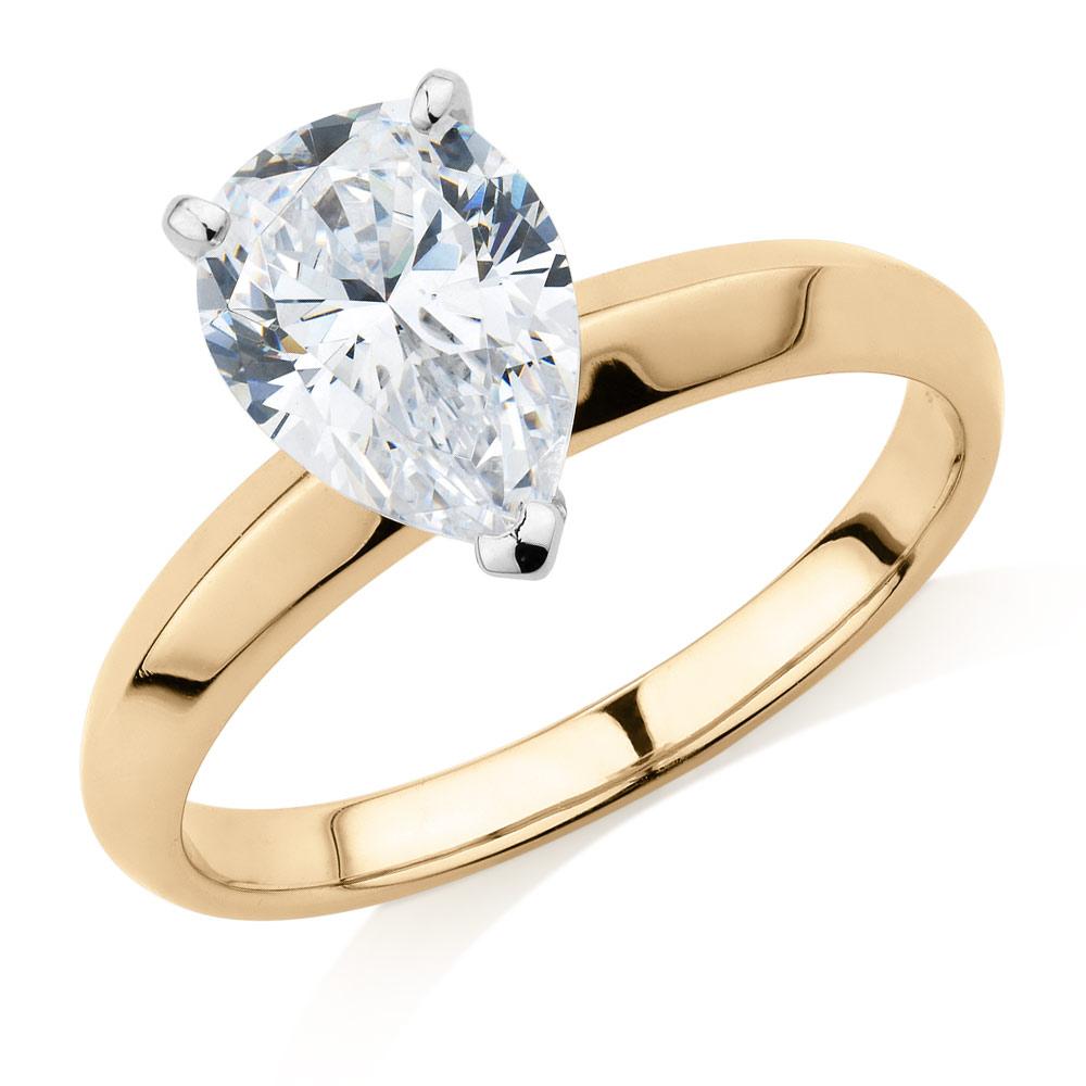 Pear solitaire engagement ring with 1.8 carat* diamond simulant in 10 carat yellow and white gold