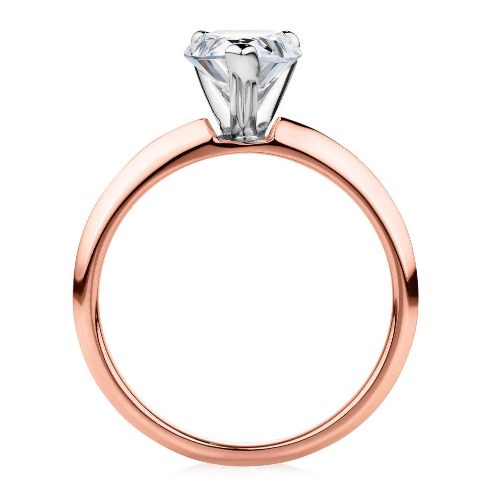 Pear solitaire engagement ring with 1.8 carat* diamond simulant in 10 carat rose and white gold