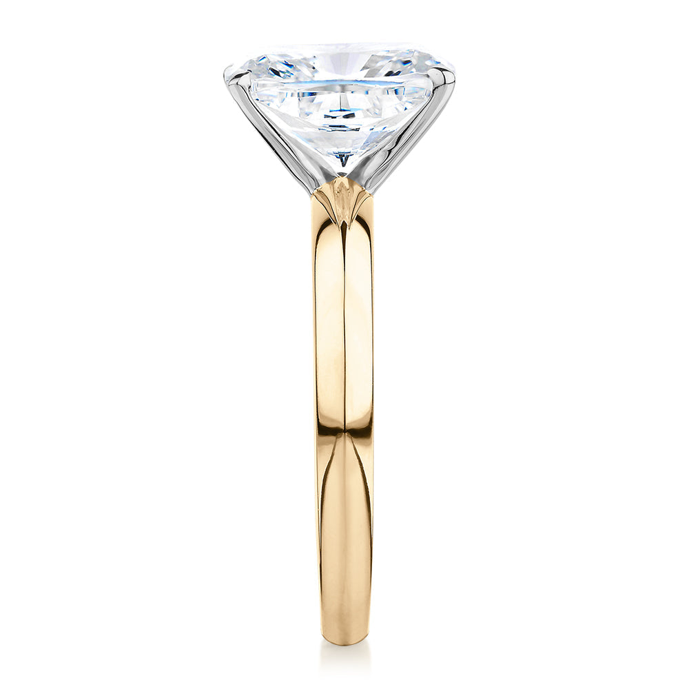 Cushion Radiant solitaire engagement ring with 3.00 carat* diamond simulant in 10 carat yellow and white gold