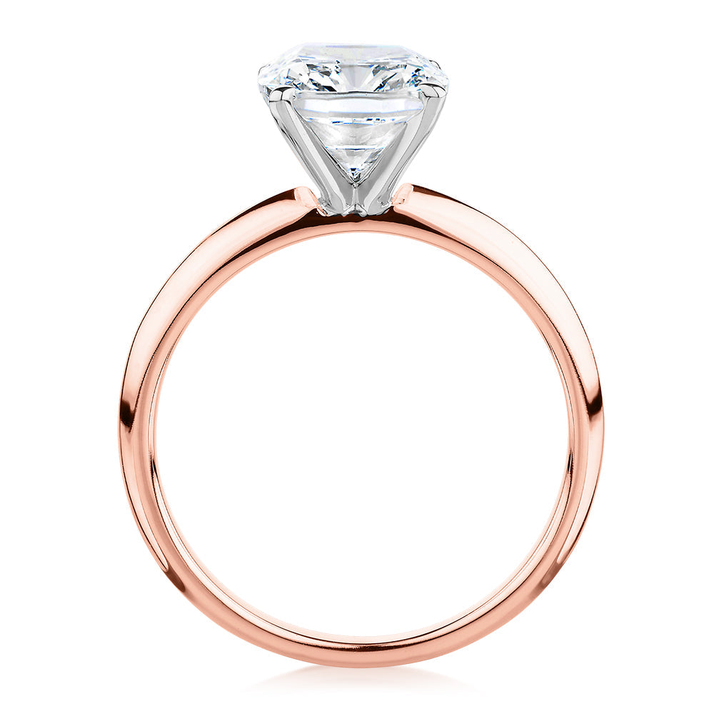 Cushion Radiant solitaire engagement ring with 3.00 carat* diamond simulant in 10 carat rose and white gold