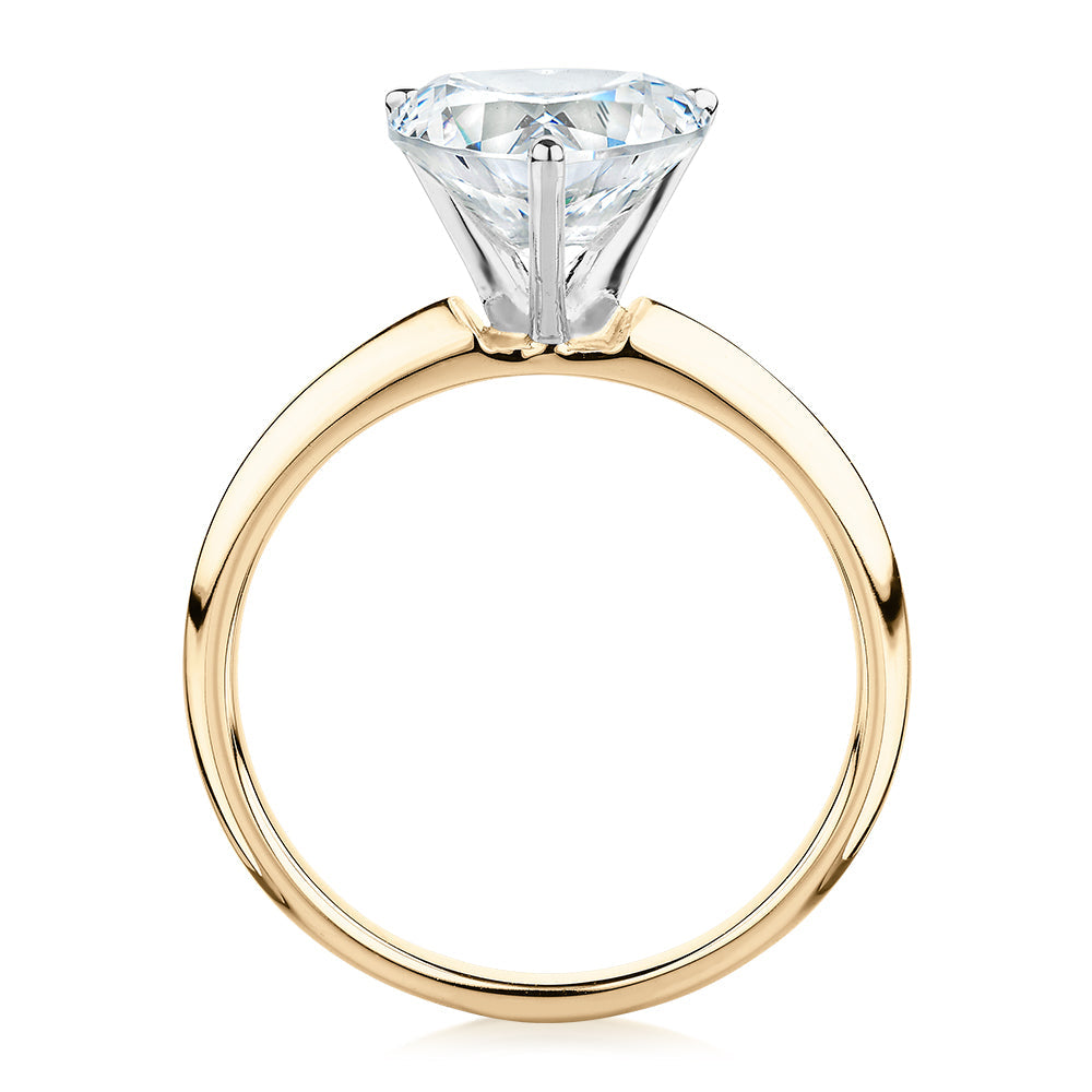 Heart solitaire engagement ring with 2.41 carat* diamond simulant in 14 carat yellow and white gold