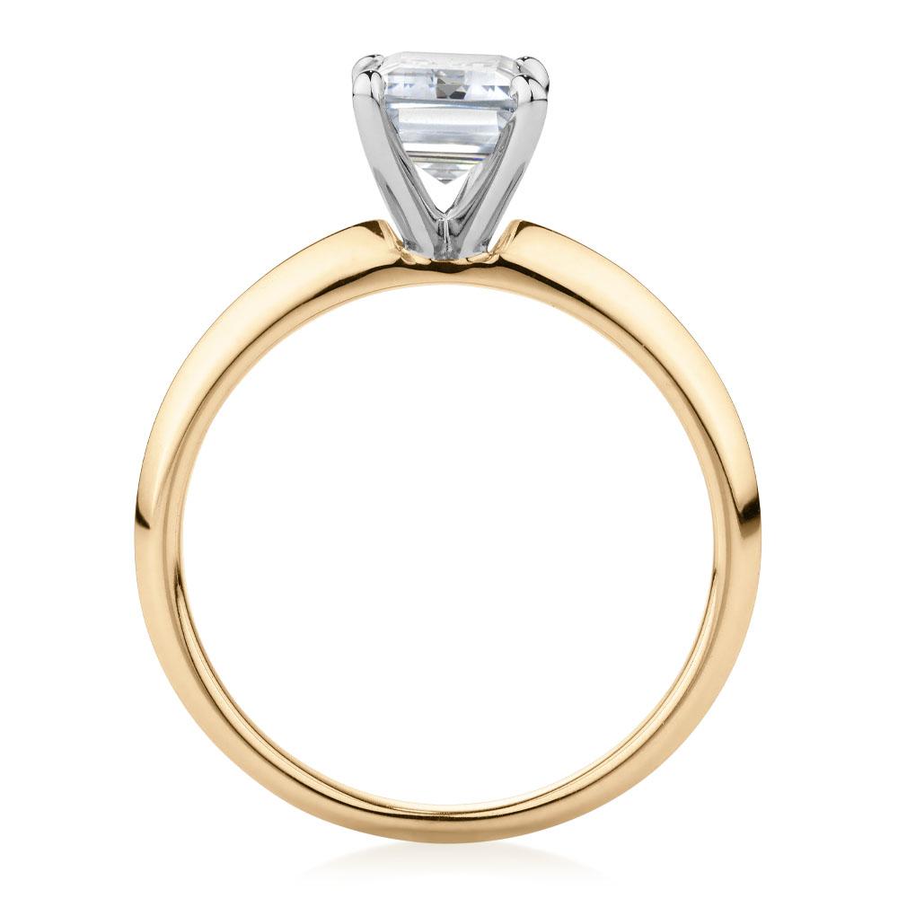Emerald Cut solitaire engagement ring with 2.17 carat* diamond simulant in 10 carat yellow and white gold