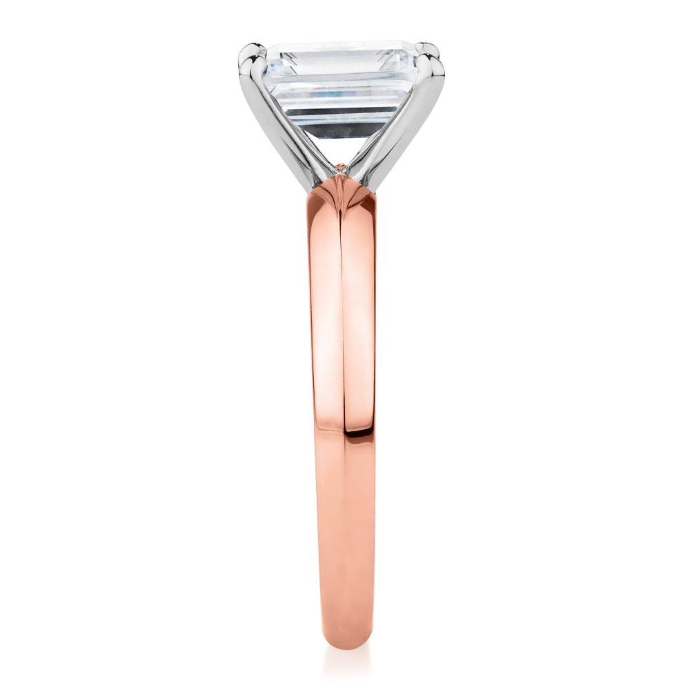 Emerald Cut solitaire engagement ring with 2.17 carat* diamond simulant in 10 carat rose and white gold