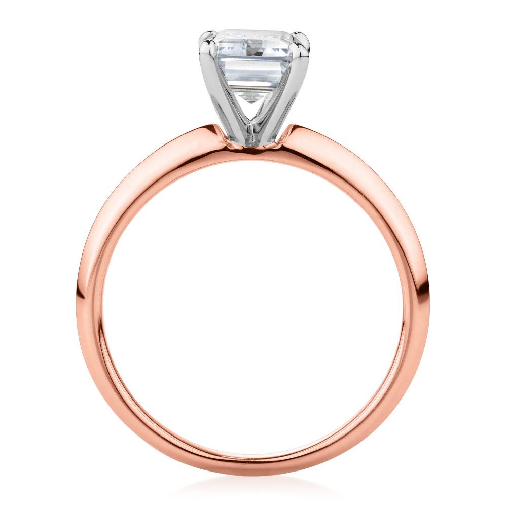 Emerald Cut solitaire engagement ring with 2.17 carat* diamond simulant in 10 carat rose and white gold