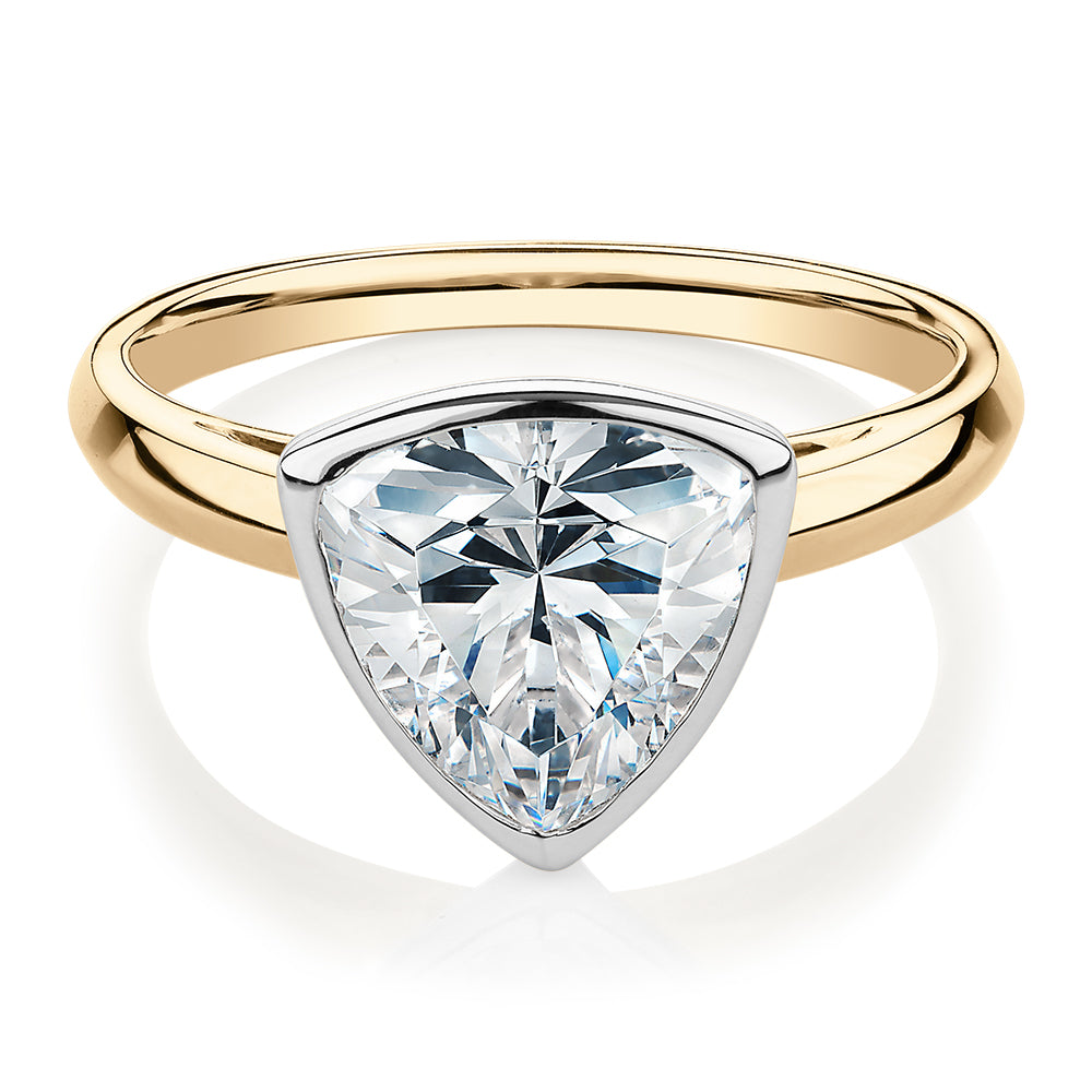Trilliant solitaire engagement ring with 2.15 carat* diamond simulant in 14 carat yellow and white gold