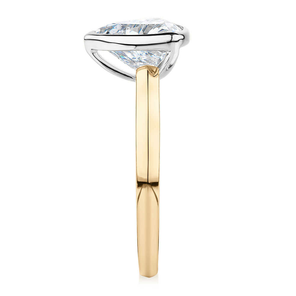Trilliant solitaire engagement ring with 2.15 carat* diamond simulant in 14 carat yellow and white gold