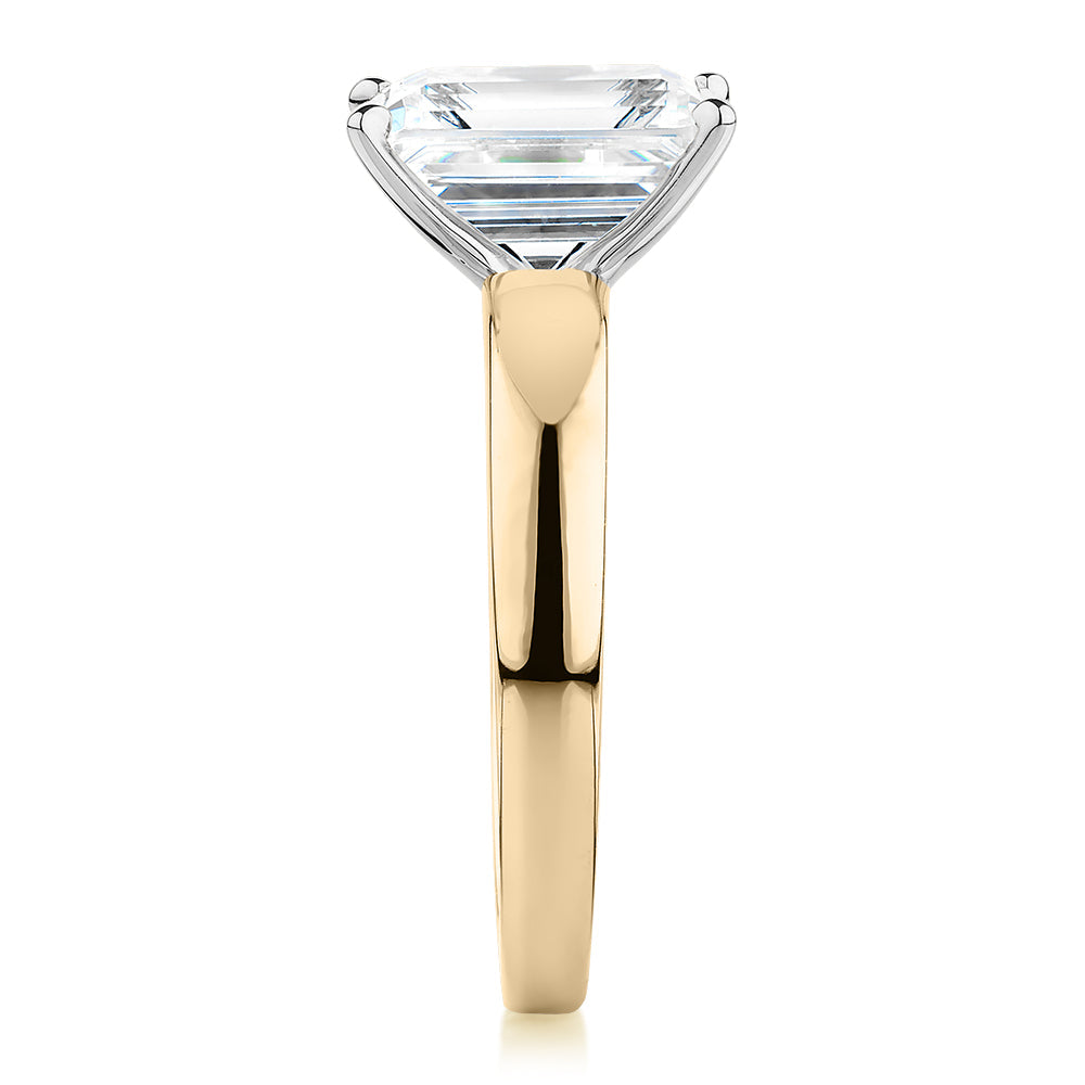 Emerald Cut solitaire engagement ring with 3.01 carat* diamond simulant in 10 carat yellow and white gold
