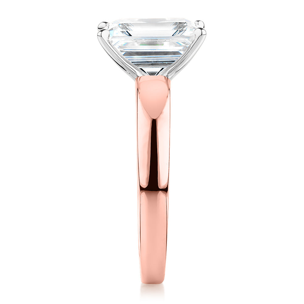 Emerald Cut solitaire engagement ring with 3.01 carat* diamond simulant in 10 carat rose and white gold