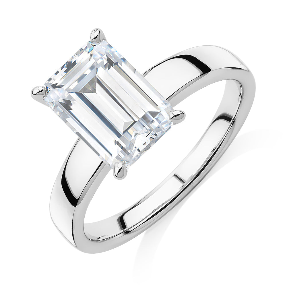 Emerald Cut solitaire engagement ring with 3.01 carat* diamond simulant in 10 carat white gold
