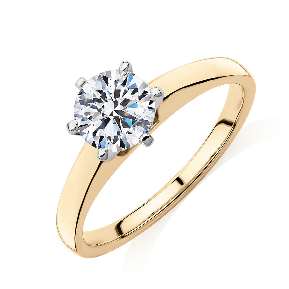 Round Brilliant solitaire engagement ring with 1 carat* diamond simulant in 14 carat yellow and white gold
