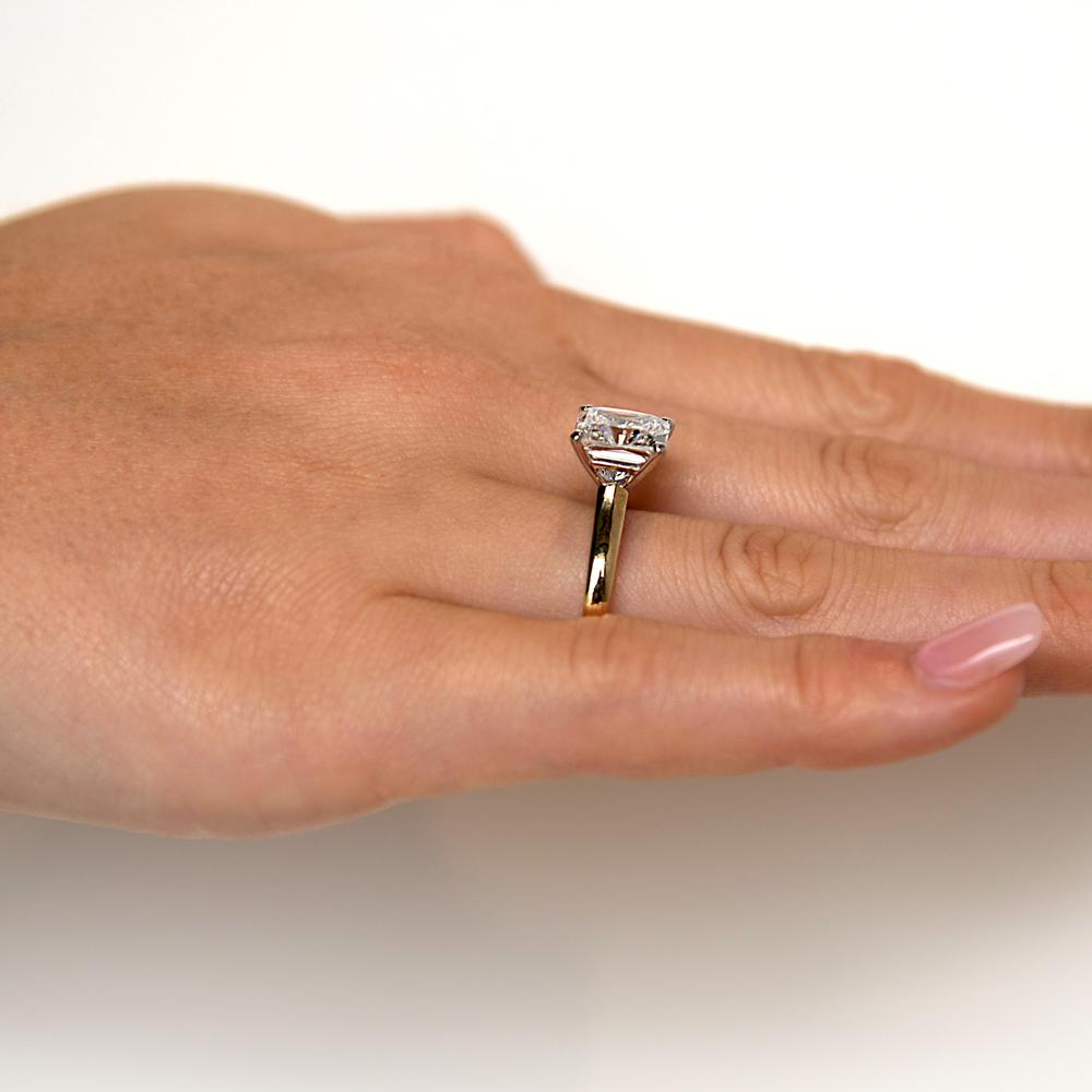 Princess Cut solitaire engagement ring with 3 carat* diamond simulant in 14 carat yellow and white gold