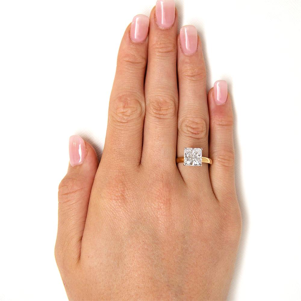 Princess Cut solitaire engagement ring with 3 carat* diamond simulant in 14 carat yellow and white gold