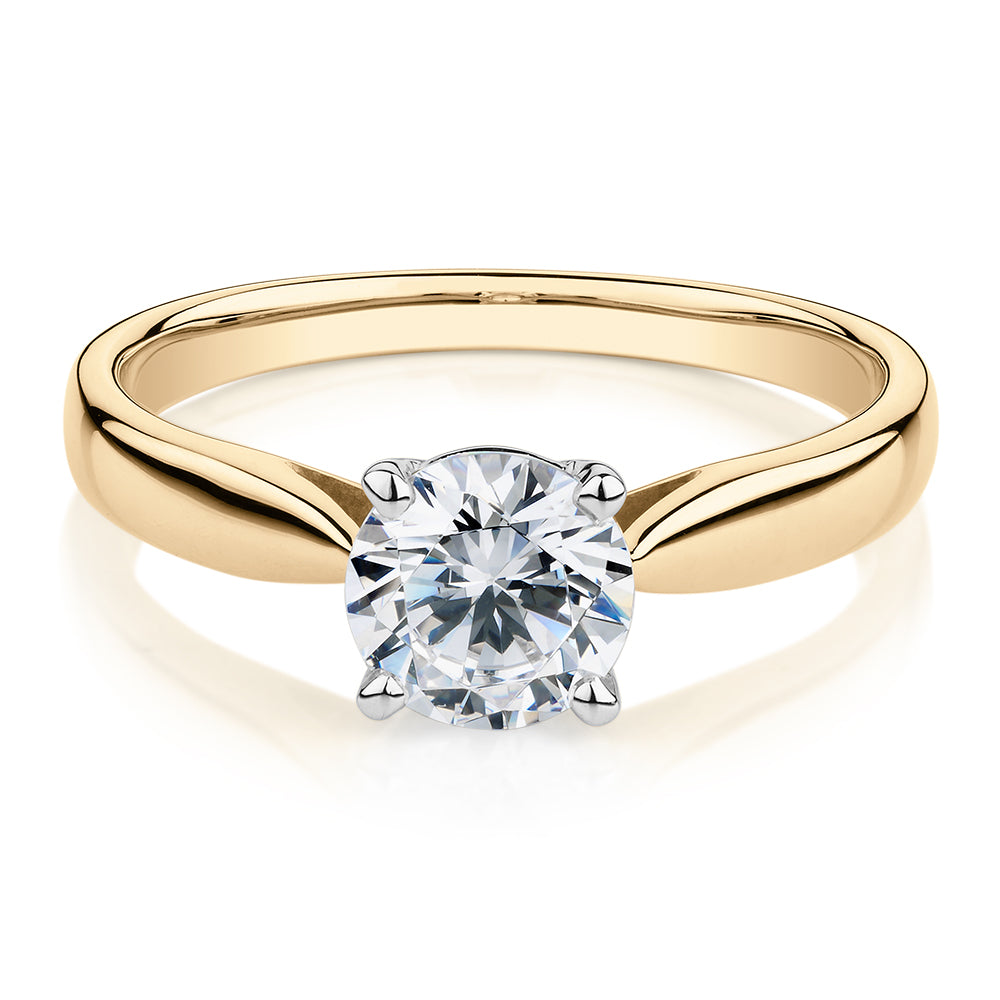 Round Brilliant solitaire engagement ring with 1 carat* diamond simulant in 10 carat yellow and white gold