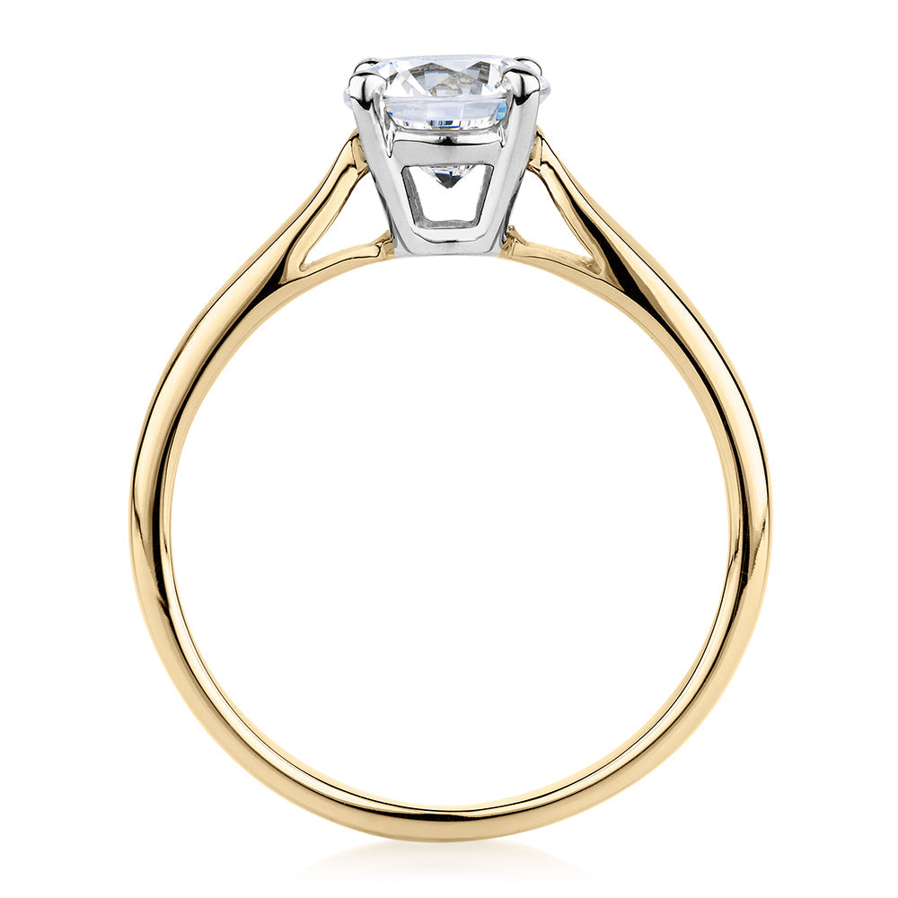 Round Brilliant solitaire engagement ring with 1 carat* diamond simulant in 10 carat yellow and white gold